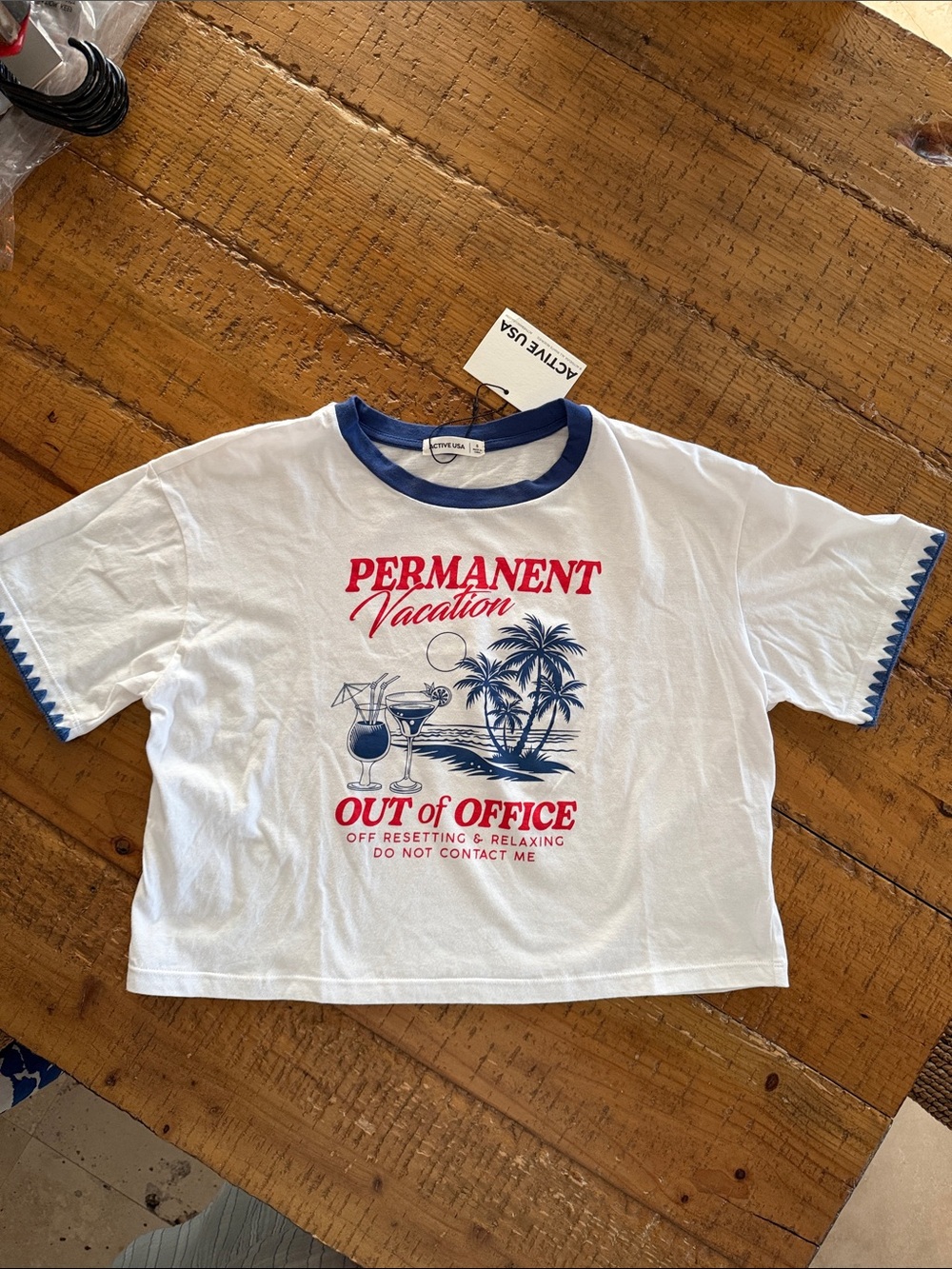 Active USA White Tee with Blue Trim & Red Graphic - 'Permanent Vacation'